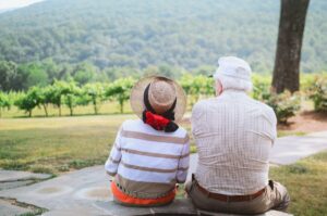 older couple sitting together