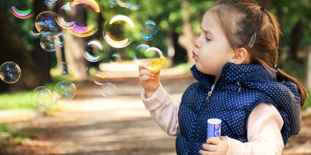 child-blowing-bubbles