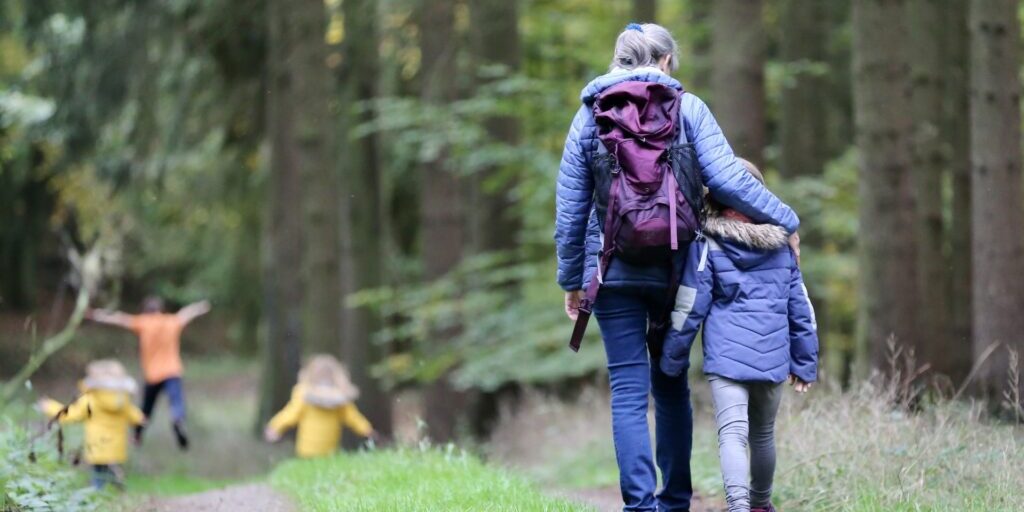 woman-hiking-with-child